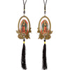 A wooden Our Lady of Guadalupe pendant charm with a gold-colored oval frame and black tassel.