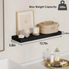 A wooden floating wall shelf organizer displaying a storage tin and candle, with weight capacity noted as 22lbs.