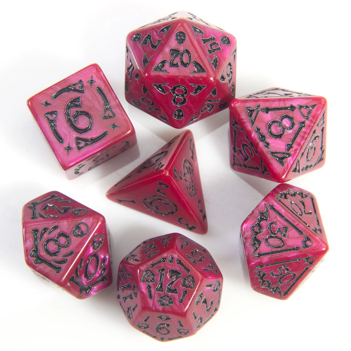 A set of seven pink and purple polyhedral dice resting on a white surface.