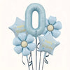A set of light blue foil balloons shaped like the number zero and flowers for a birthday celebration