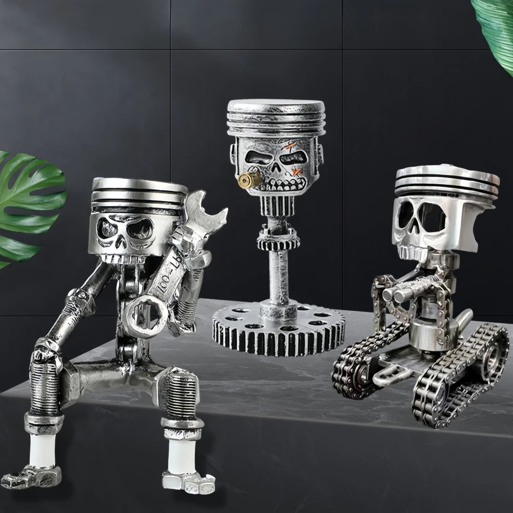 A set of mechanical punk style piston skull sculptures made of silver metal.
