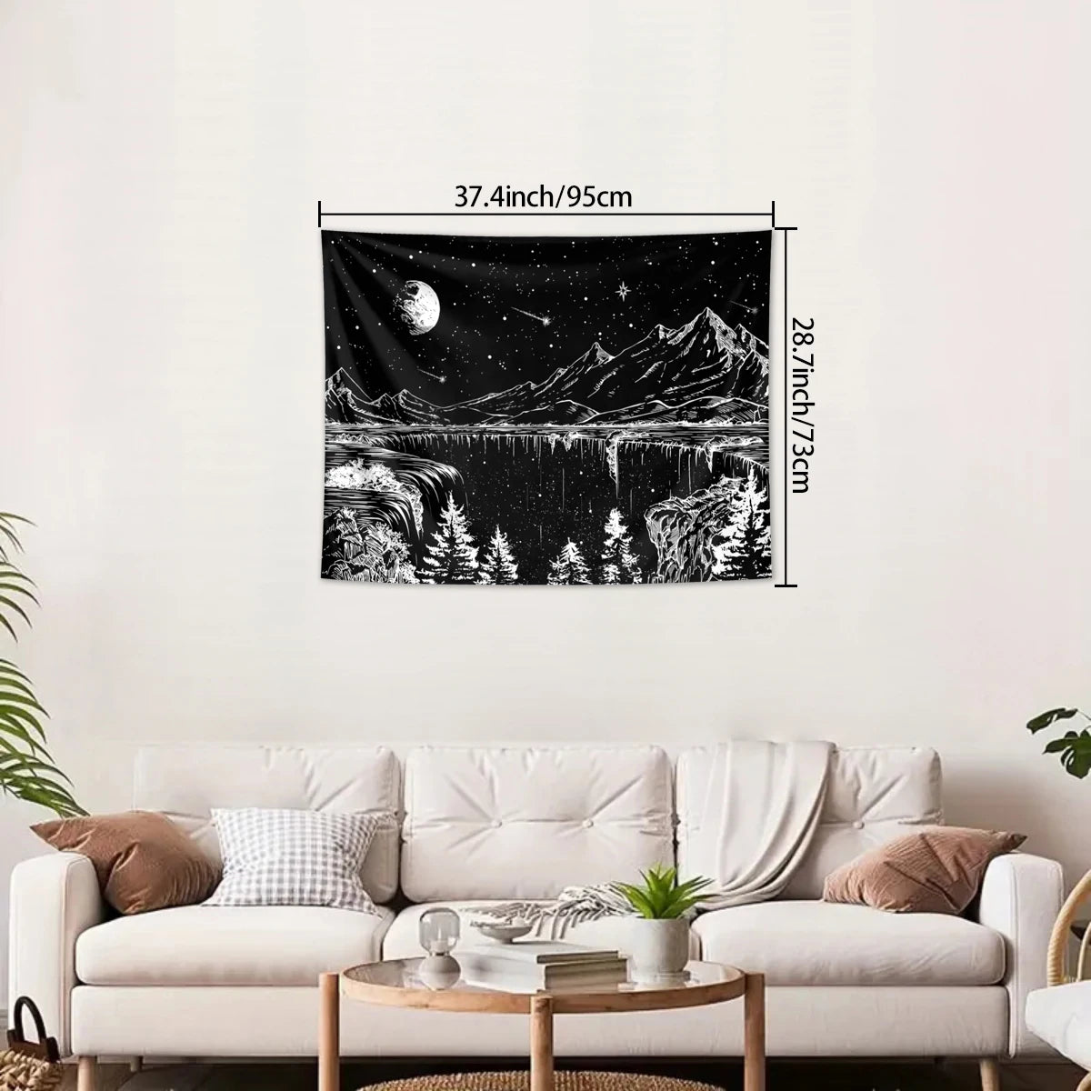 A black tapestry depicting a starry night landscape with mountains and water.