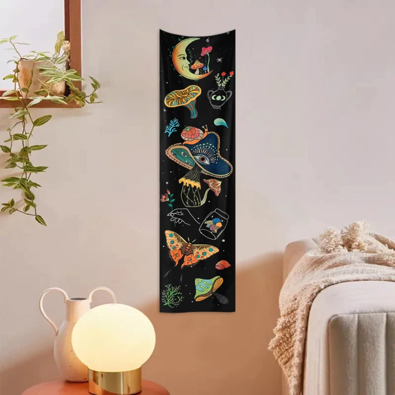 A vertical tapestry featuring celestial elements like the sun, moon, and various mushrooms and flowers on a black background.