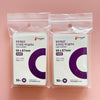 Two clear plastic bags containing 50 packs each of purple card sleeves labeled as premium card sleeves