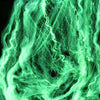A vibrant green glow-in-the-dark spider web pattern with small black spiders against a dark background.