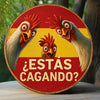A round wooden sign featuring a retro rooster design with a Spanish flag theme on a red background.