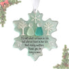 A light mint green snowflake-shaped ornament featuring two stylized figures, suitable for friendship or seasonal decor.