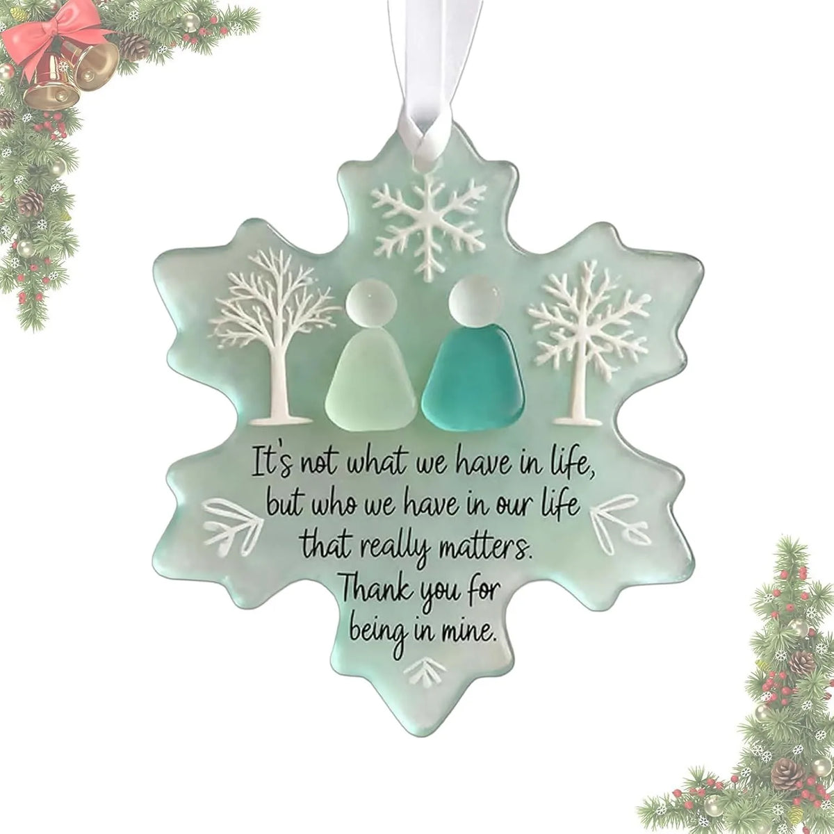 A light mint green snowflake-shaped ornament featuring two stylized figures, suitable for friendship or seasonal decor.