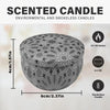 A round gray scented candle jar with an intricate geometric pattern, shown from above and the side.