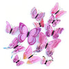 A set of twelve pink and purple 3D magnetic butterfly wall decor pieces.