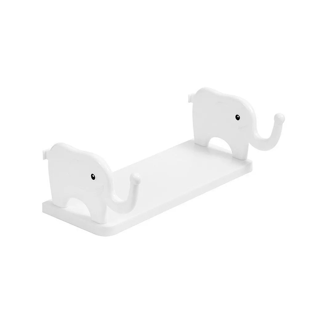 White adhesive elephant storage rack designed for wall organization.