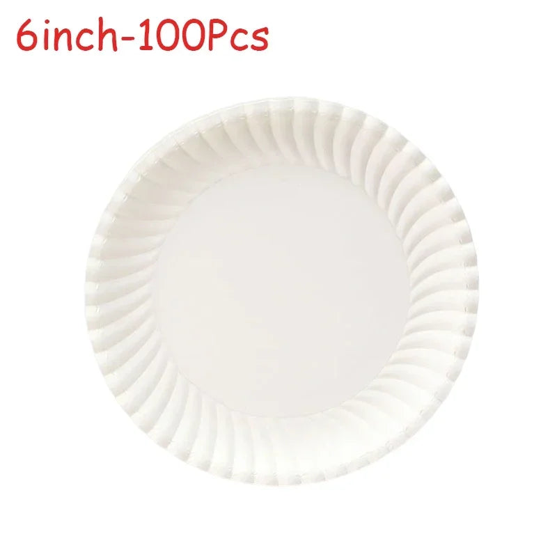 A white paper plate with a ruffled edge, suitable for parties and everyday use.
