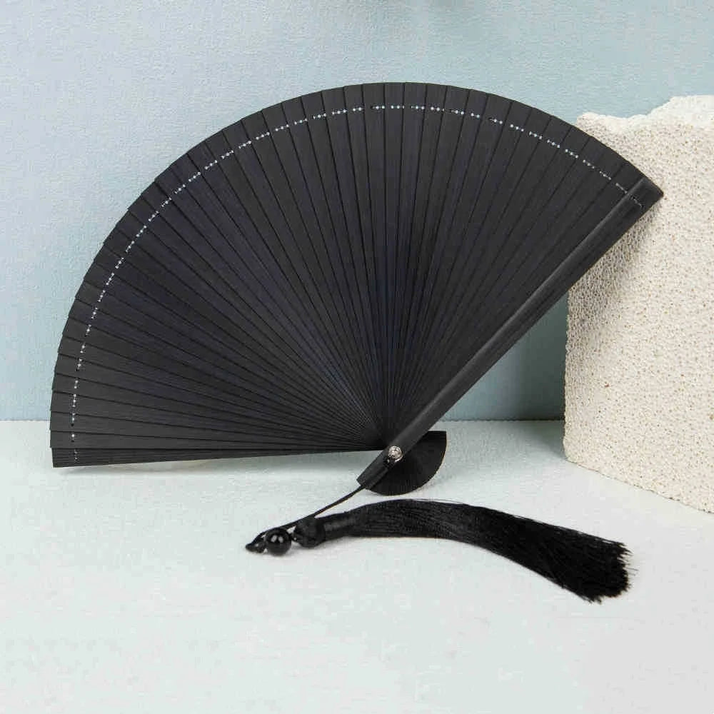 Traditional Bamboo Folding Fan with Solid Color Design