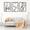 A set of three black line art prints depicting holding hands, a heart, and a profile of a face.