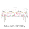 Pink floral tablecloth featuring sweet baby phrases for a baby shower decoration