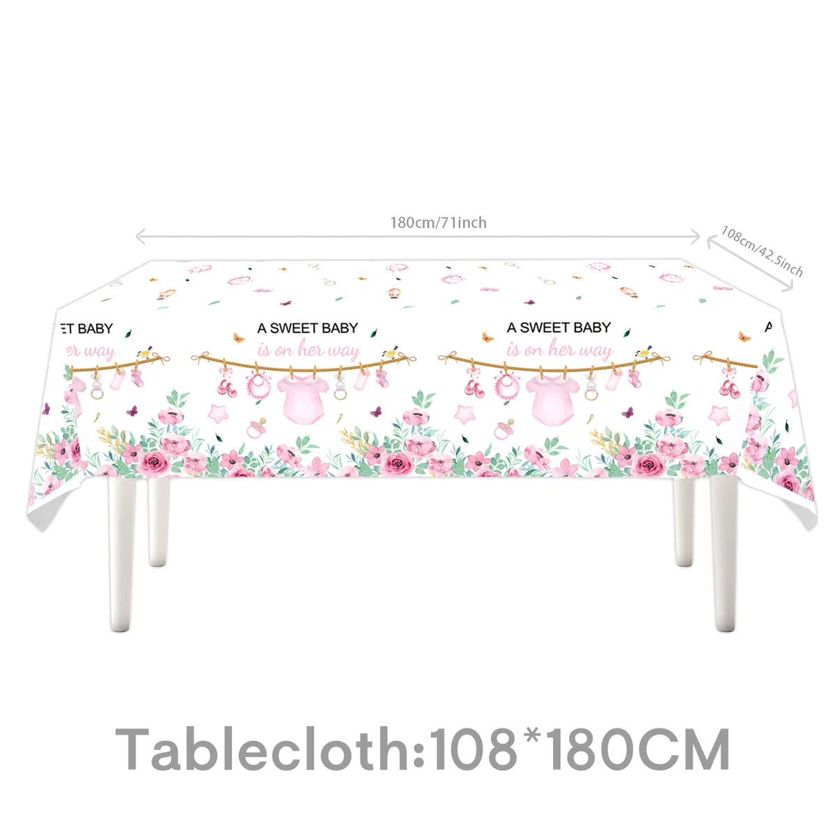 Pink floral tablecloth featuring sweet baby phrases for a baby shower decoration
