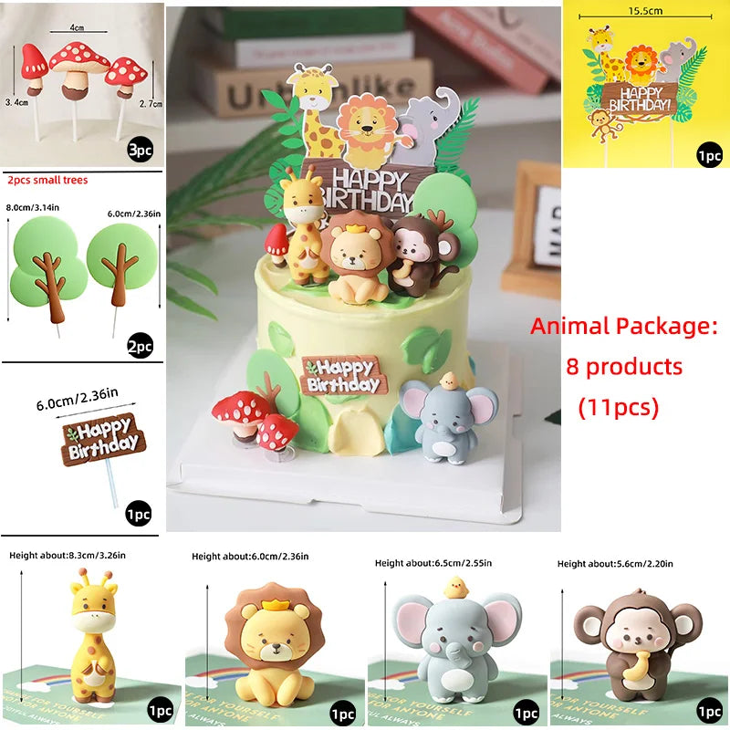 A set of eight animal cake toppers, including lion, elephant, monkey, and others, displayed on a yellow cake.