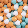 A pile of colorful, round plastic balls in shades of orange, yellow, white, and light blue.