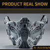 A gray tactical silicone half-face mask shown in a studio setting.
