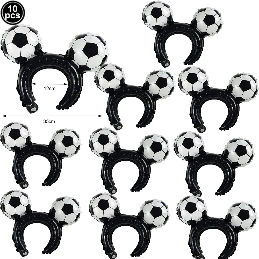 A pack of ten black and white soccer ball balloons used for party decorations.