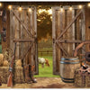 A rustic wooden barn door backdrop featuring antique Western tools, leather boots, and a wooden wagon wheel.