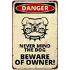 Vintage tin sign with a graphic warning about danger and beware of the dog owner.