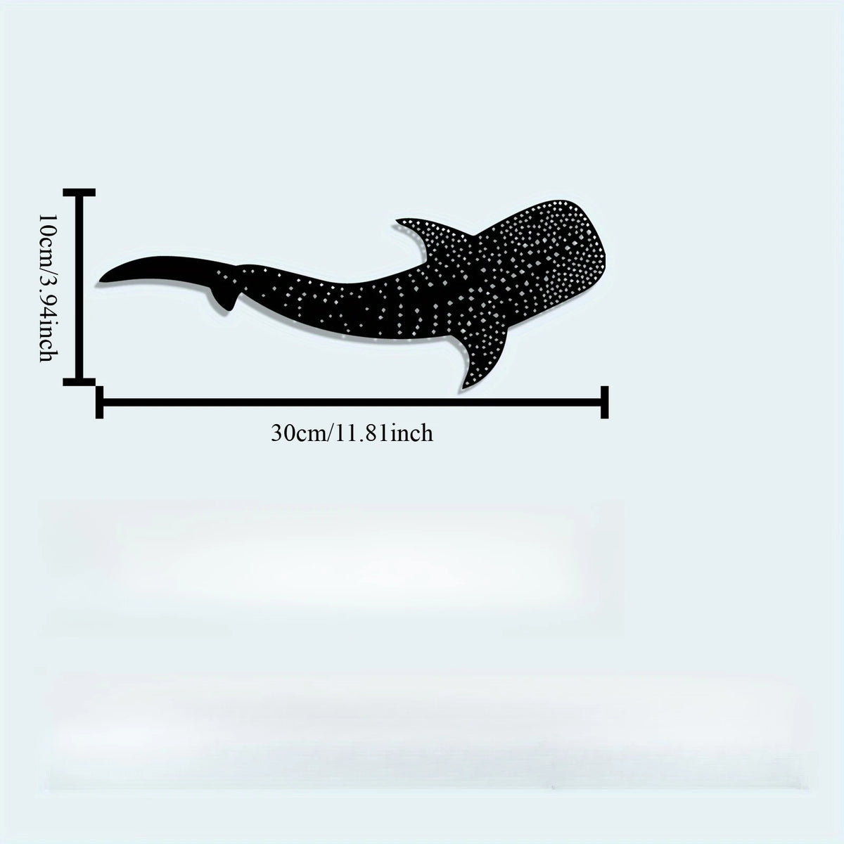 Black silhouette of a whale shark with speckled texture, shown with dimensions.