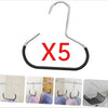 Five black round multi-purpose closet hooks for hanging hats, scarves, and bags.