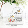 Clear heart-shaped glass ornament with floral and butterfly designs and text for Mom