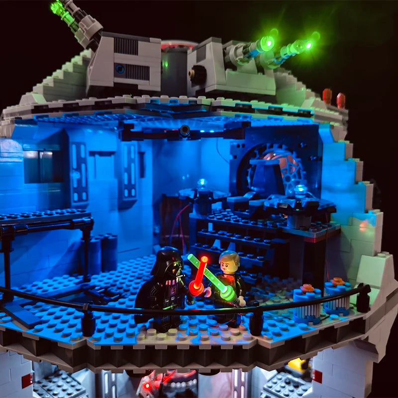 A LEGO Death Star model illuminated with blue LED lighting.