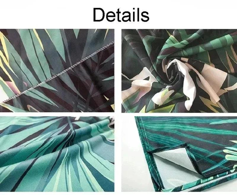 Close-up details of a dark green and black tropical leaf patterned fabric used for tapestry wall decor.