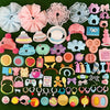 A variety pack of 35 mini pet shop accessories including silicone toys, jewelry, and small items in various colors.
