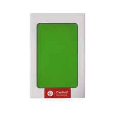A white rectangular kit with a green window for a baby handprint and footprint keepsake.