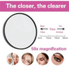 A round magnifying makeup mirror showing various facial features at different distances.