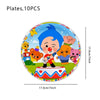 A circular plate featuring cartoon circus characters including a blue-haired boy, an orange bear, and a pink cat.