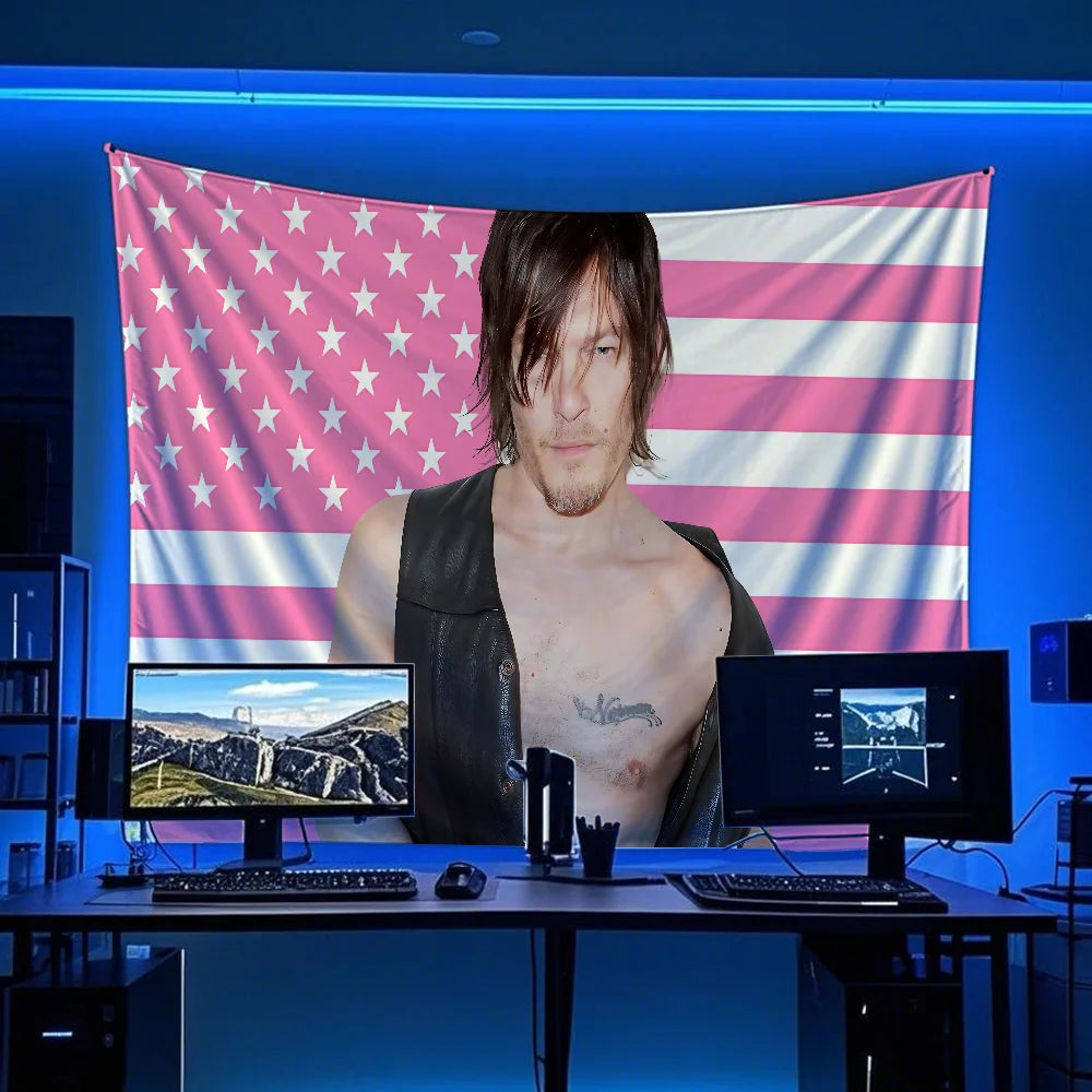 A banner featuring the American flag design displayed on a screen in a dark studio setting.