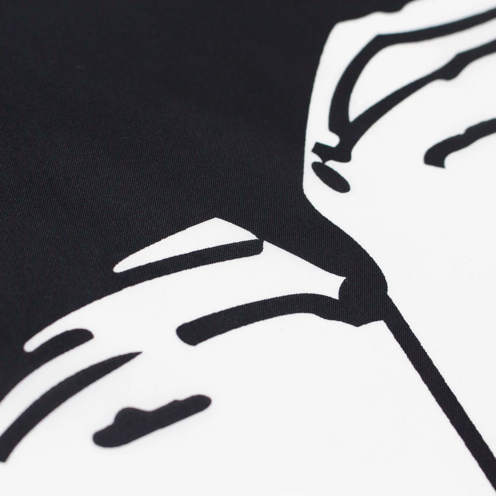 A black and white graphic design featuring stylized lines on a fabric, likely for an outdoor flag.