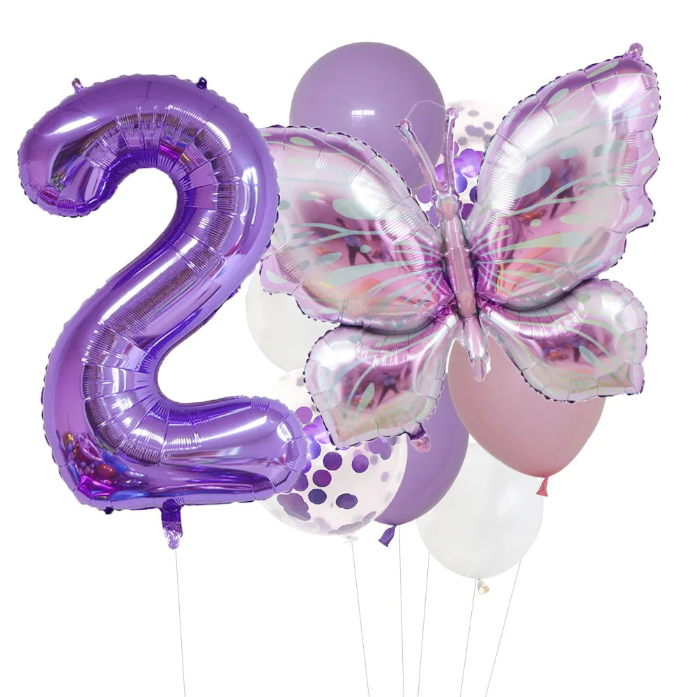 A set of purple foil balloons shaped like the number 2 and a butterfly