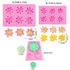 A set of pink and yellow lotus leaf silicone molds for cake decorating, including various flower shapes.