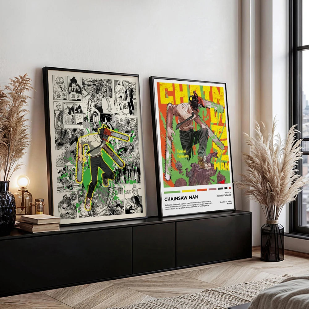 A display of two framed Chainsaw Man anime canvas wall art posters on a dark cabinet.