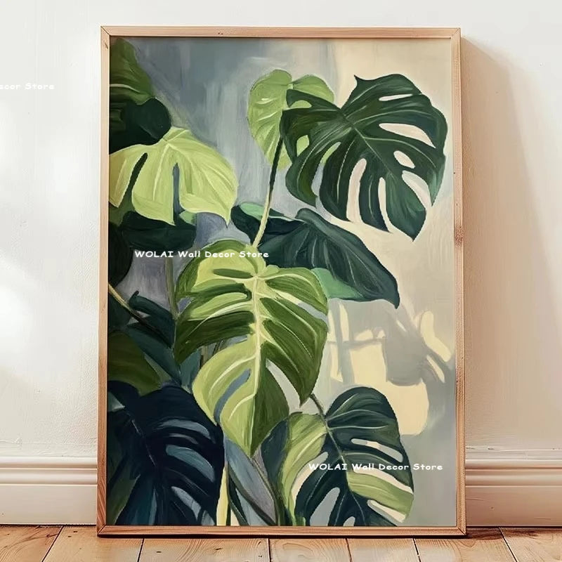 Botanical philodendron canvas wall art featuring large green leaves on a light background.