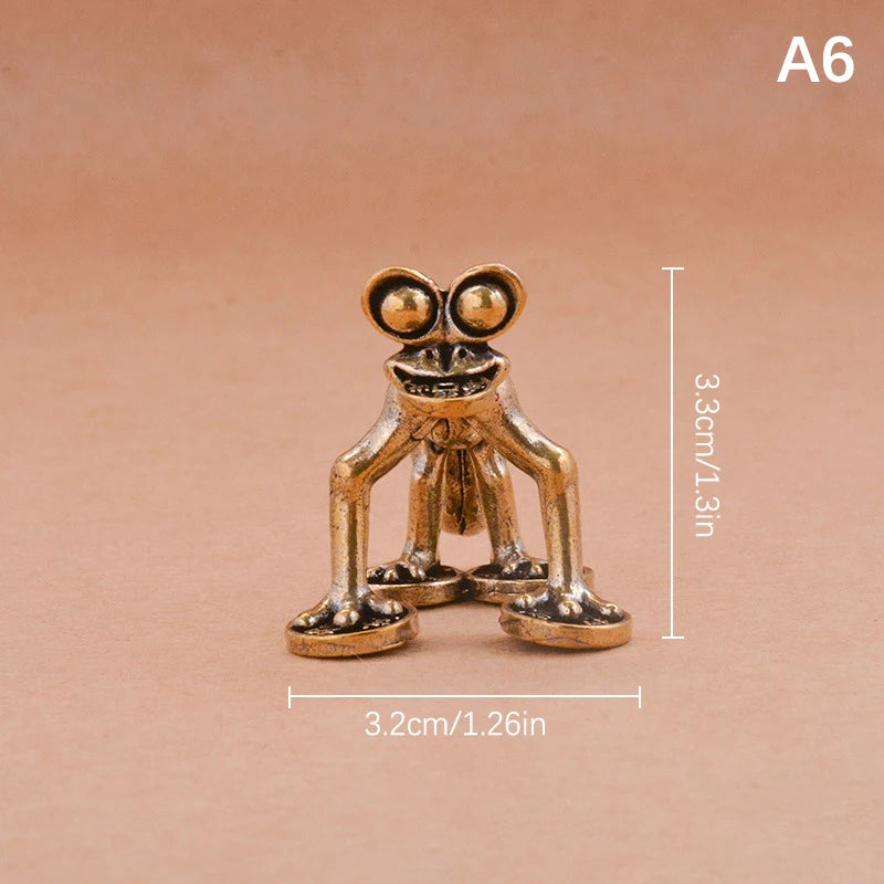 Vintage brass frog statue desktop ornament with a rectangular base and large eyes
