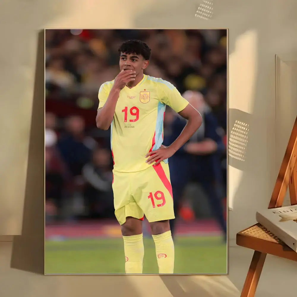 A poster featuring Lamine Yamal in a yellow soccer uniform on a field.