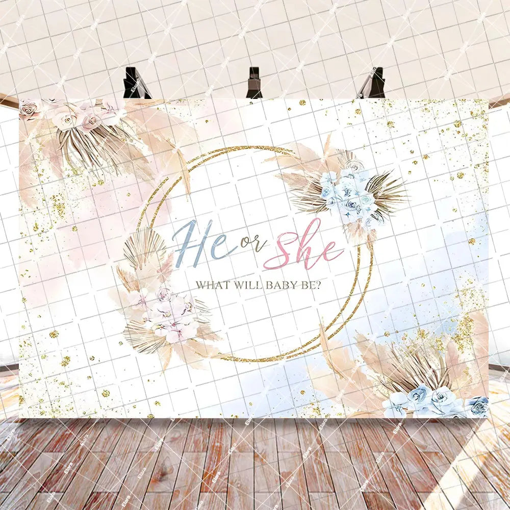 A watercolor-style gender reveal backdrop featuring floral elements and gold accents for a baby announcement.