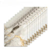 A set of marble effect self-adhesive wall stickers in beige and gold tones arranged in a diagonal row.