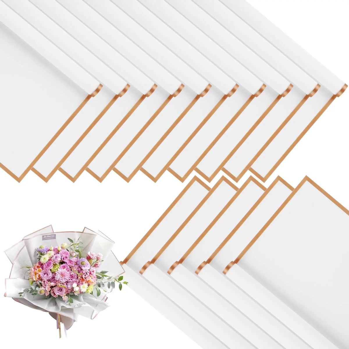Rolls of white decorative flower wrapping paper with gold edges stacked and partially unwrapped.