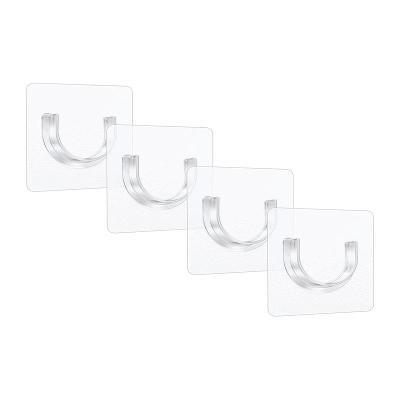 A pack of four clear self-adhesive curtain rod brackets for mounting without drilling.