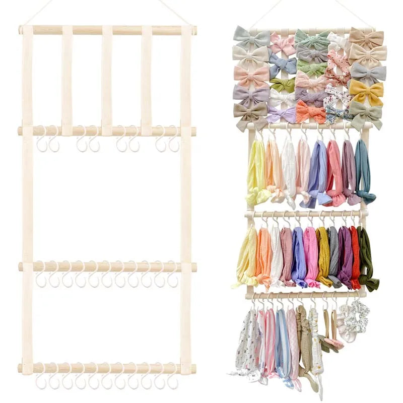 Wall-mounted headband holder displaying various pastel colored fabric headbands.