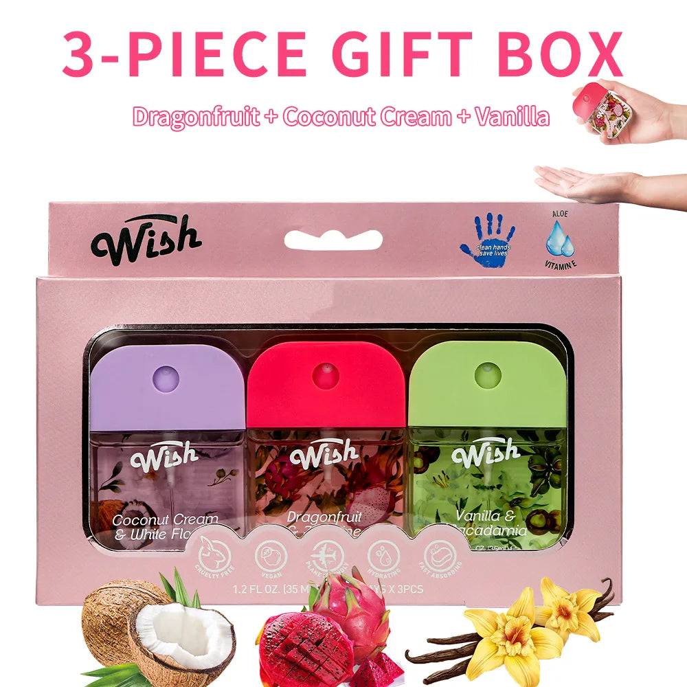 A pink gift box containing three Wish moisturizing hand sanitizer sprays: Dragonfruit, Coconut Cream, and Vanilla.