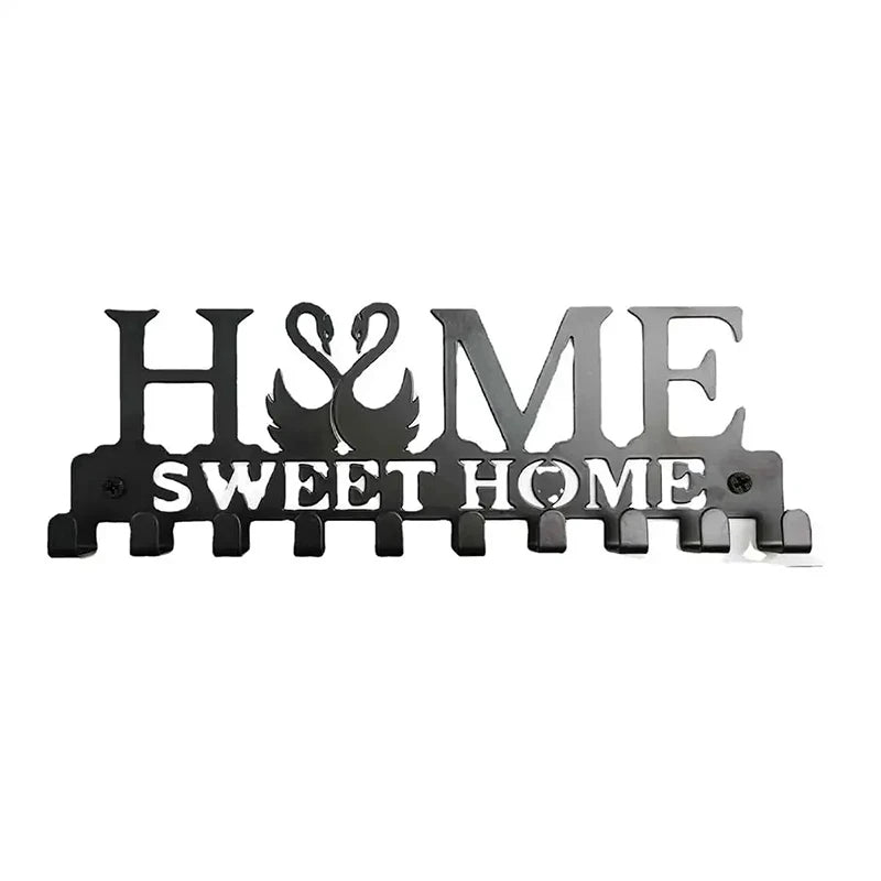 Black metal key holder with H&ME and Sweet Home text and wall mounted hooks
